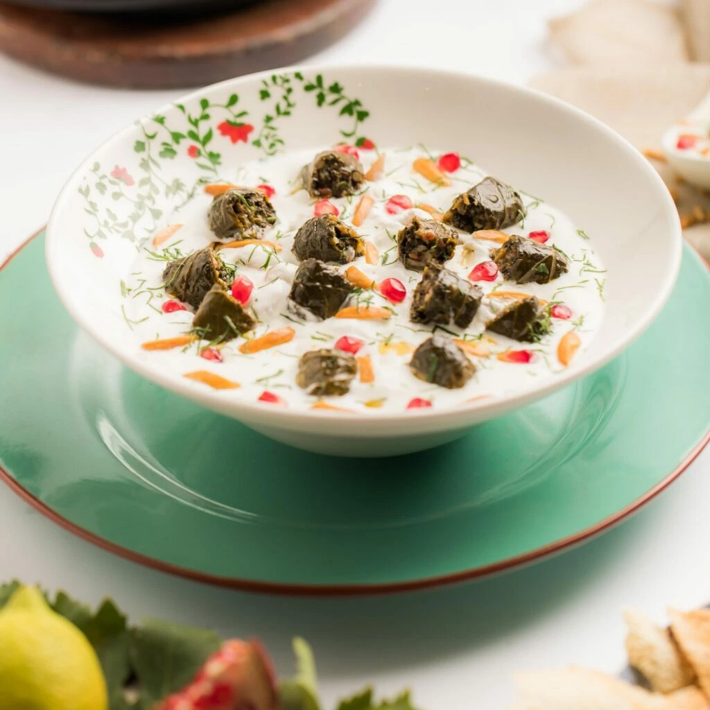 Fatteh with vine leaves